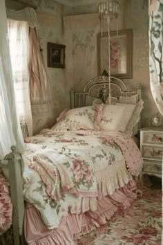 an old fashioned bedroom with pink and white bedding