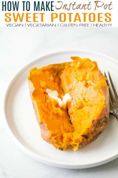 a white plate topped with sweet potatoes on top of a table next to a fork