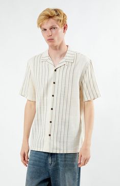 Embrace effortless style with the Neutral Striped Camp Shirt from PacSun. Made from soft cotton, this shirt features a relaxed fit, classic collared neckline, and short sleeves, making it a versatile and comfortable addition to your casual wardrobe.Collared necklineShort sleevesStandard fitStripedButton closures100% CottonMachine washableModel is wearing size mediumModel Measurements: 6â3â Height, 28â Waist, 33.5â Hips PacSun Mens Neutral Striped Camp Shirt - Multicolor size Large Spring Camp Collar T-shirt With Relaxed Fit, Collared Cotton T-shirt For Beach, Relaxed Fit Collared T-shirt For Beach, Summer T-shirt With Button Closure, Casual Short Sleeve Shirt With Placket For Summer, Casual Summer Shirt With Placket, Summer T-shirt With Placket And Short Sleeves, Collared Cotton T-shirt For The Beach, Collared Cotton Beach T-shirt