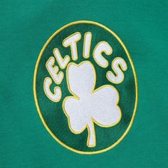 the boston celtic logo is shown on a green t - shirt that says, let it's st patrick's day