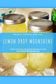 three mason jars filled with lemon drop - in