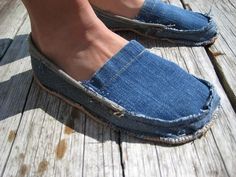 a person's feet in blue jeans on a wooden deck with the caption clasf