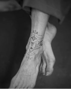 a person with a tattoo on their foot