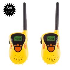 two yellow walkie talkies sitting next to each other on top of a white background