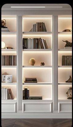 an image of a book shelf with many books on it's shelves in the room