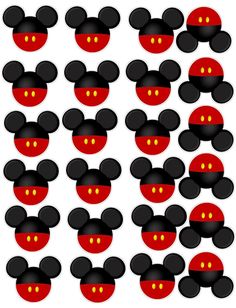 mickey mouse ears with red and black circles in the shape of heads on white background