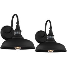 two black wall lights with one light on each side and the other off to the side