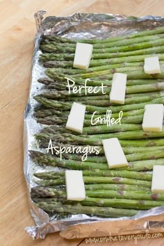 asparagus wrapped in foil with butter and parmesan cheese