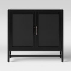 a black cabinet with two doors on the front and one door open to reveal something