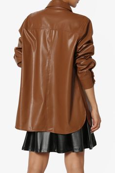 Layer up in the coated finish faux leather shirt. This outer layer can be worn open or buttoned up for extra warmth. Reaching mid-thigh and with long sleeves, you'll be effortlessly stylish every time. Wear with a crop top and denim pants, or leather bottom.Casually-cool vibe of a shirt jacket designed with an easy-to-layer snap buttoned frontPoint collar, Flap chest pockets, Curved hemLong sleeves with button cuffs, Oversized fitFits true to US size, S=Size(4-6), M=Size(8-10), L=Size(12-14), XL