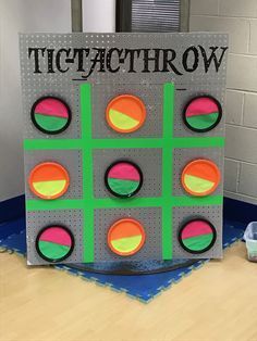 a giant tic - tacthrrow game in the middle of a room