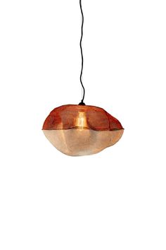 a light hanging from a ceiling fixture