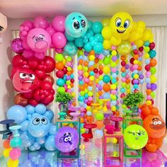 an assortment of balloons and decorations for a birthday party