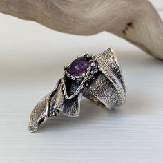 "Handmade silver ring with natural purple amethyst cabochon. Large and comfortable ring for your everyday look. Magic design and natural purple color of amethyst give this ring an unusual and \"crazy\" look. To say the truth, we love to create jewelry that will be unique and must have an uncommon design. If you want to be in the center of attention, just choose handmade and express your uniqueness Shahinian Jewelry: Inspiring by nature and the infinite beauty of the space... FULL DETAILS】 ► Gems Unique Amethyst Ring For Anniversary, Unique Purple Gemstone Ring, Unique Amethyst Promise Ring, Handmade Purple Amethyst Birthstone Ring, Unique Amethyst Gemstone Ring, Unique Amethyst Open Ring, Unique Amethyst Birthstone Ring, Sterling Silver Amethyst Ring, Unique Purple Amethyst Promise Ring