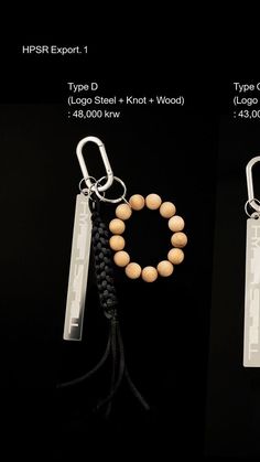 two different types of key chains with wooden beads on one side and black cord on the other