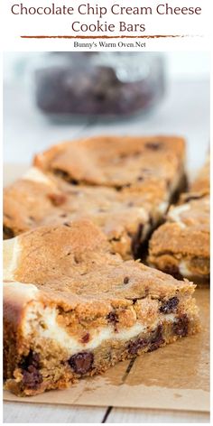 chocolate chip cream cheese cookie bars are cut into squares and stacked on top of each other