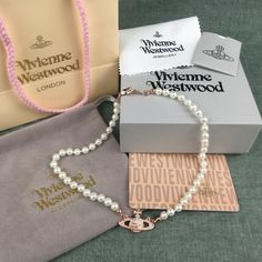 "Brand New Vivienne Westwood Rose Gold Orb Pearl Choker Necklace Button Necklace (Brand New) Brand New, Never Worn, Nwot 100% Authentic Comes With Gift Box, Gift Bag, And Dust Bag,Brand Cards,Instruction Manual,Jewelt Cloth. Full Packing As Inculded. Necklace Packed In Secure Packaging For Transit The Length Was : 16.5'' Welcome To Vivienne Westwood Pearl Necklace, Vivienne Westwood Jewellery, Saturn Necklace, Button Necklace, Square Necklace, Pearl Choker Necklace, Silver Choker, Necklace Brands, Gold Choker Necklace