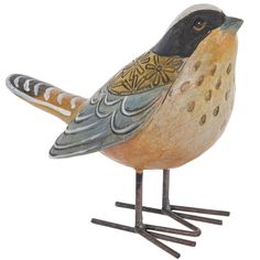 a ceramic bird sitting on top of a metal stand