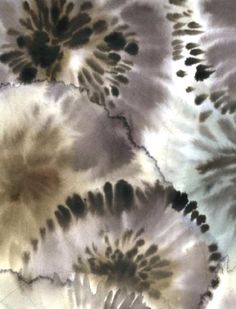 an abstract tie - dye pattern with black and white colors