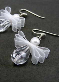 the earrings are made out of clear plastic