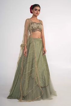 Shop for Merge Design Green Blouse Layered Lehenga Set for Women Online at Aza Fashions Green Embellished Sharara For Party, Green Embellished Raw Silk Set, Green Embellished Party Wear Sets, Unstitched Embellished Green Sharara, Green Embellished Unstitched Sharara, Embellished Green Organza Lehenga, Party Lehenga In Green Raw Silk, Green Embellished Party Wear Choli, Green Cutdana Dupatta For Party