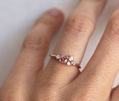 https://www.capucinne.com/products/small-cluster-ring-delicate-cluster-ring-5063?_pos=5&_sid=186a64c1c&_ss=r Tanzanite Engagement Ring, Peach Sapphire, Sterling Silver Jewelry Rings, Ring Sapphire, Rings Cool, Champagne Diamond, Emerald Engagement Ring, Eternity Band Diamond, Diamond Cluster Ring