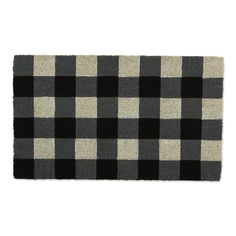 a black and white checkered rug on a white background