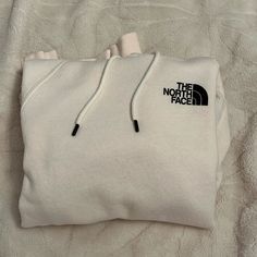 North Face Excellent Condition Never Worn North Face Hoodie Women, The North Face Athleisure Hoodie With Drawstring, The North Face Sporty Sweatshirt With Ribbed Cuffs, Comfy White Fleece Hoodie, White Comfy Hooded Hoodie, Cozy White Hoodie For Outdoor Wear, Cozy White Hoodie For Outdoor, Cream Casual Hoodie With Cozy Fit, Cream Casual Cozy Fit Hoodie