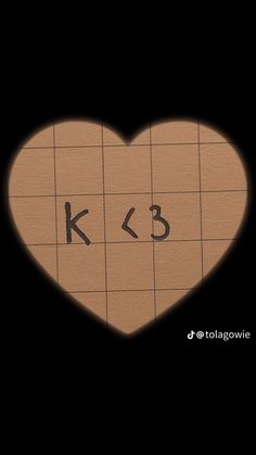 a heart with the letters k and b on it's side, in front of a black background