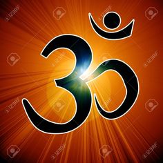 the om shan symbol on an orange background with rays stock photo - 957982