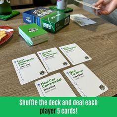 four cards on a table with the words shuffle the deck and deal each player's cards