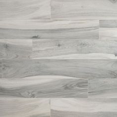 white and grey wood flooring that looks like it has been painted in different shades