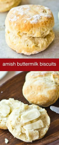 buttermilk biscuits on a wooden cutting board with butter spread over the top and bottom