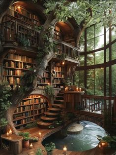 a room filled with lots of books next to a tree and water fountain in front of a large window