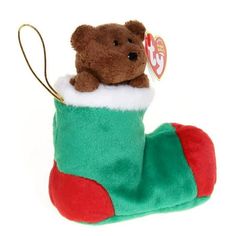 a teddy bear in a christmas stocking ornament