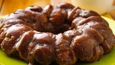 a bundt cake sitting on top of a green plate