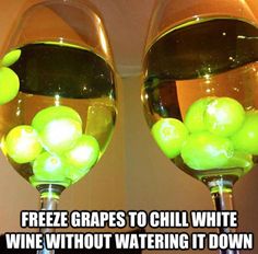 two wine glasses with grapes in them and the caption reads, freeze grapes to chill white wine without watering it down