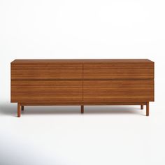 the sideboard is made out of wood and has two drawers on each side, one with