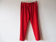 Vintage Bright Red Pants Women Red Pants High Waist Pants Scarlet Red Trousers Red Formal Wear Medium Size Pants Label Size: UK 10 / EUR 38 Measurements: Waist: 31.5" Hips: 44" From crotch to waist line: 10.5" Length: 38" Please check measurements to insure a proper fit. Remember to allow yourself some extra room for movement. You can compare these with something from your closet that fits you well. Please convo me if you need additional measurements. This pants will come to you freshly laundered and ready to wear. Condition: Great vintage Condition SHIPPING * I ship worldwide via Priority mail (Latvijas Pasts) from Latvia (EU). * I ship from Europe, so please allow 2 to 4 weeks for the package to arrive if you live overseas. * Europe 5 - 10 business days. Go back to my shop: VintageDreamB White Skirt Summer, Red Trousers, Printed Flare Pants, Festival Skirts, Bohemian Blouses, High Waist Pants, Red Pants, Waist Pants, High Waisted Pants