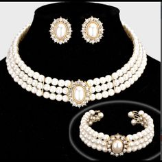 Gorgeous Rhinestone Trimmed Pearl Necklace Three-Piece Necklace Set. Perfect For Bride, Bridal Party & Any Special Occasion. Description: Necklace Size: 11 + 3 L Decor Size: 1 L Bracelet Size: 1 H / Cuff Earrings Size: 1 L This Item Is Non-Returnable Pearl Choker Wedding, White Pearl Choker, Formal Necklace, Clear Necklace, Clear Earrings, Pearl Necklace Designs, Mother Of Pearl Jewelry, Pearl Necklace Earrings, Pearl Necklace Set