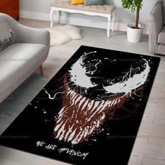 a living room area rug with the image of a spider - man's face on it