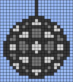 a cross - stitch pattern with a black and white skull in the center on a blue background