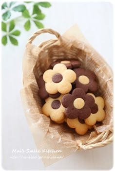 a basket filled with cookies sitting on top of a table