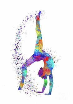 a person doing a handstand in front of a white background with colorful paint splatters