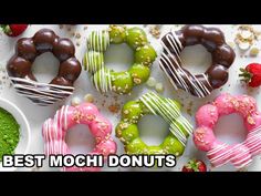 there are many donuts with different toppings on them