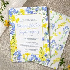 two yellow and blue flowers are next to each other on the same sheet of paper