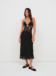 One of our most sexy slip dresses ever—the Sharon black slip dress is crafted in a flowing chiffon with shimmering rhinestones scattered throughout. This maxi slip dress features underwire cups, a fully boned drop waist bodice, and a scalloped lace trim at the hem. Wear it out and about this sparkle season. Slip Dress Black, Slip Dresses, Black Slip Dress, Maxi Slip Dress, Wedding Lingerie, Feminine Beauty, Pink Design, Scalloped Lace, Black Slip Ons