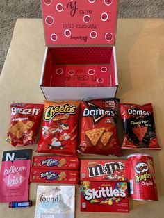 a box filled with lots of different types of snacks