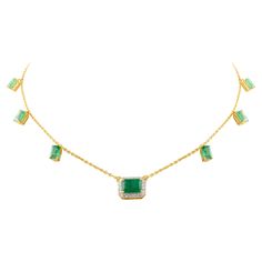 Emerald Charm Necklace in 14K Gold studded with octagon cut emerald and diamonds. This stunning piece of jewelry instantly elevates a casual look or dressy outfit. Emerald enhances intellectual capacity of the person. Designed with octagon cut emerald set in center with halo of diamonds with octagon cut emerald dangling on the chain making a stunning delicate necklace. This beautiful handcrafted necklace is a perfect Unique Gift, Bridal Shower Gift, Secret Santa Gift, Gift For Sister, Mother Dau Luxury Rectangular Emerald Necklace, Luxury Emerald Cut Emerald Necklace With Diamond Accents, Elegant Rectangular Emerald Necklace For Formal Occasions, Elegant Rectangular Emerald Necklace For Formal Events, Elegant Green Rectangular Emerald Necklace, Formal Emerald Necklace With Single Cut Diamonds, Elegant Rectangular Emerald Necklace, Luxury Emerald-cut Emerald Diamond Necklace, Elegant Octagon Green Necklace