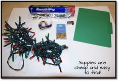 the supplies needed to make christmas lights are laid out on top of a white table